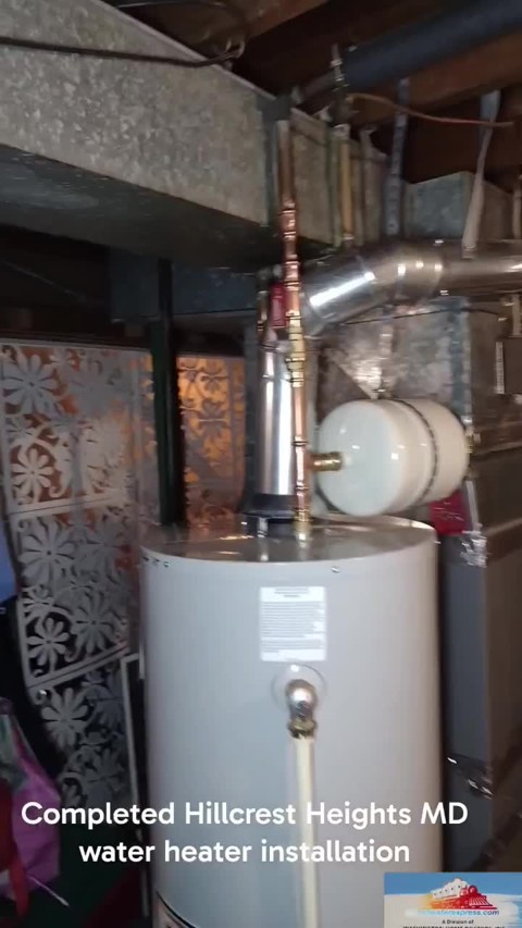 Completed water-heater replacement with connected piping and vent in Hillcrest Heights, Maryland