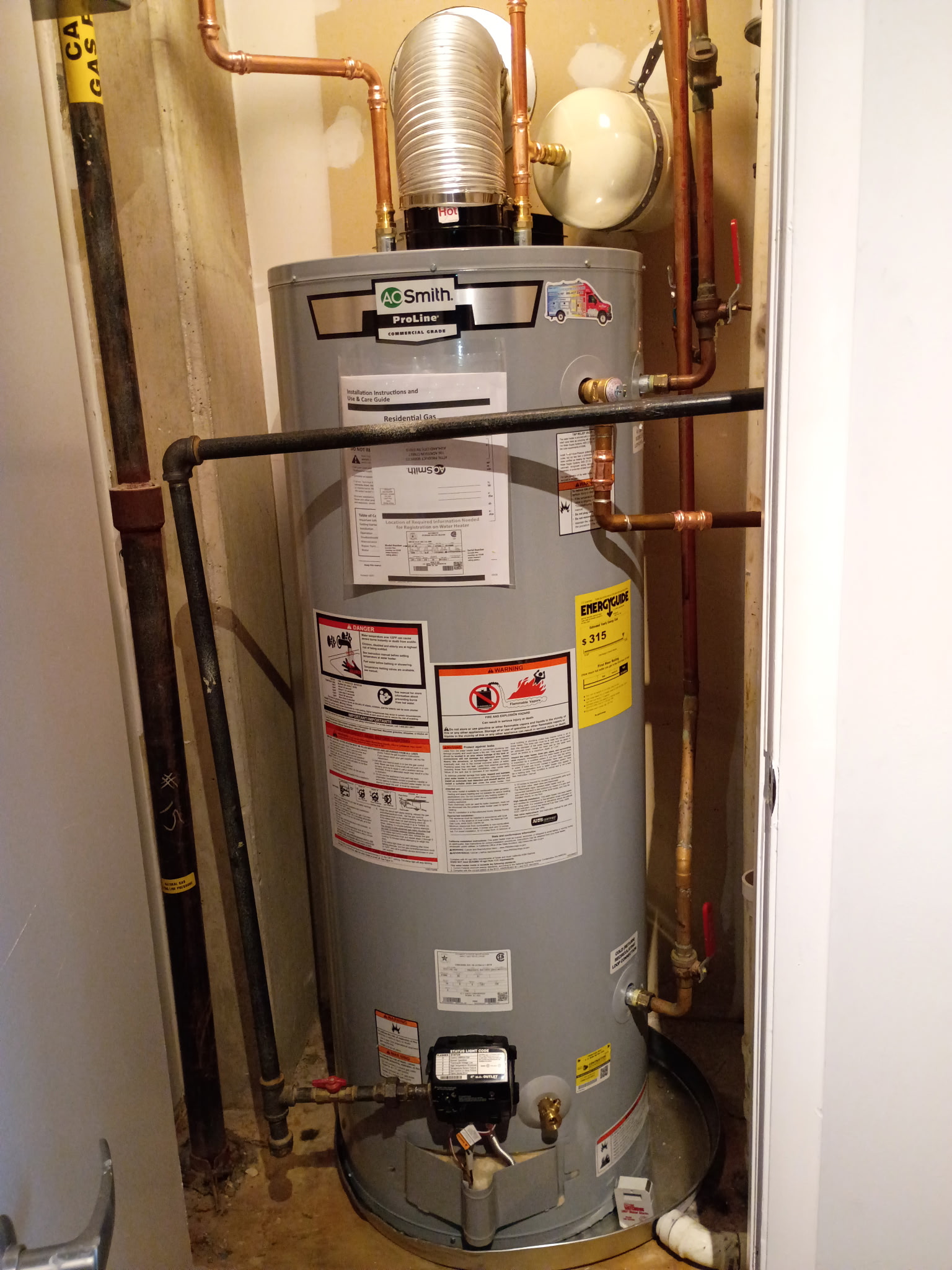Copper connections and expansion tank on a Northwest DC direct-vent water heater