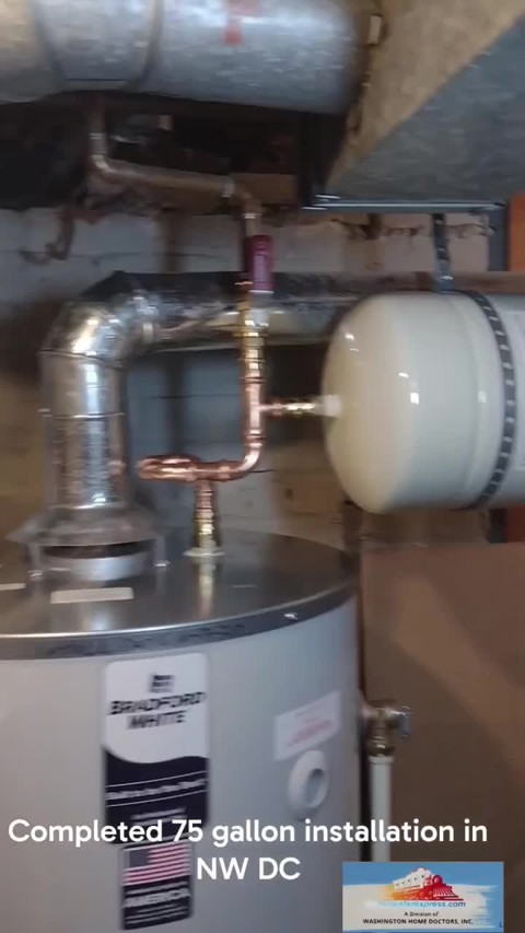 Completed 75-gallon water heater with vent and connected piping in Northwest Washington, DC
