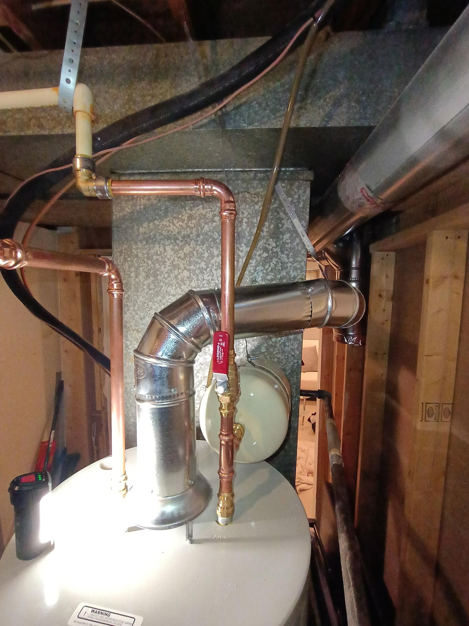 New copper connections, shutoff valve and expansion tank on the finished installation